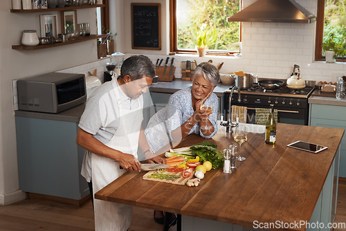 Image of Happiness, cooking old man and woman with wine in kitchen, healthy food and bonding time together in home. Drink, glass and vegetables, senior couple with vegetable meal prep and diet in retirement.