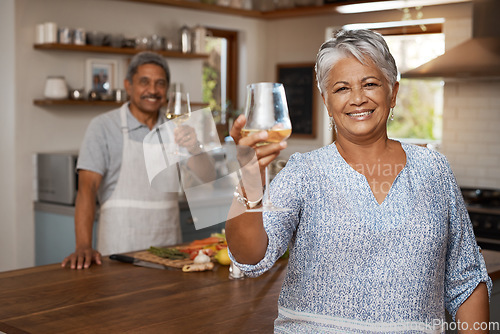 Image of Cheers, wine and portrait of old couple in kitchen cooking healthy food together in home with smile. Toast, drinks and senior woman with man, glass raised and happiness, diet meal prep and retirement