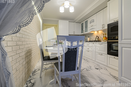 Image of White kitchen in classic style