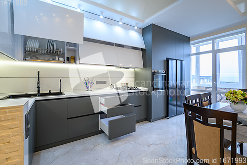 Image of Luxury white and dark grey modern kitchen interior