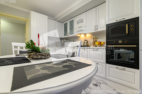 Image of White kitchen in classic style just before the Christmas