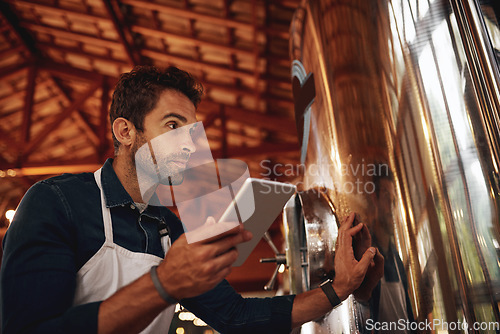 Image of Tablet, beer and quality control with man in factory for production, manufacturing and alcohol fermentation. Technology, inspection and digital with business owner for distillery, storage and brewery