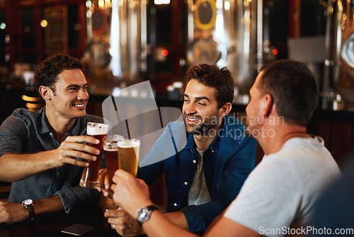 Image of Beer, cheers and men drinking with friends at social event in a restaurant with happiness. Alcohol, glasses and toast at a pub at happy hour with smile and conversation with drinks and celebration