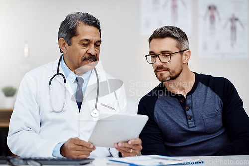 Image of Results, talking and doctor with a man and tablet for consulting, advice and help with health. Planning, medicine and a mature hospital worker speaking to a patient about medical service on tech