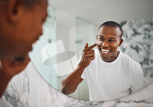 Image of Happy, skincare and mirror with black man in bathroom for beauty, morning and grooming. Cleaning, hygiene and self care with reflection of person and cream at home for facial, natural and wellness