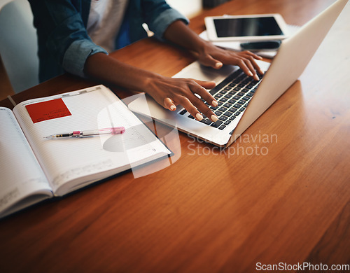 Image of Woman hands, typing and laptop with work from home and learning notes. Student, female person and computer working with paperwork, notebook and writing in a house doing web research with mockup