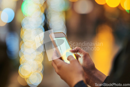 Image of Bokeh, hands and cellphone for typing in city, internet scroll and web browsing at night mockup space. Phone, hand closeup and woman networking, online social media and mobile app for email outdoor.