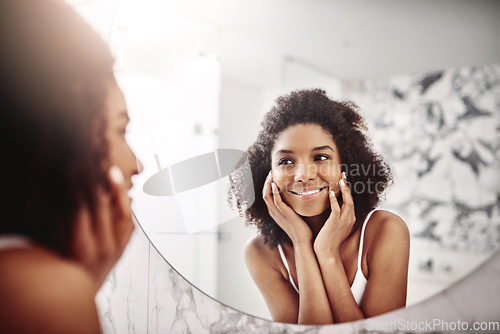 Image of Woman, skincare and dermatology in mirror with a smile in the bathroom for wellness at a hotel. Model, happy and beauty with skin, glow for self care in the morning at an apartment for healthy face.