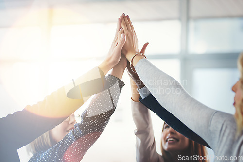 Image of Business people, group high five and motivation for collaboration for support, trust or goal in insurance company. Team building, hands and connection for synergy, teamwork or solidarity in workplace