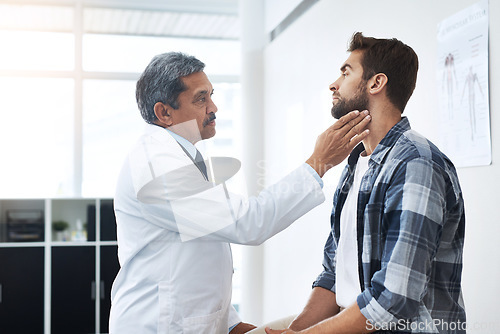 Image of Healthcare, consultation and doctor checking neck of patient with advice, help and examination. Medicine, health care and Indian man with throat pain in doctors office consulting medical professional