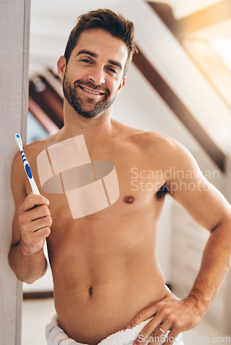 Image of Toothbrush, portrait and shirtless man brushing teeth in home for dental wellness, healthy smile, body or mouth care. Happy male in bathroom for oral cleaning, fresh breath and hygiene in the morning