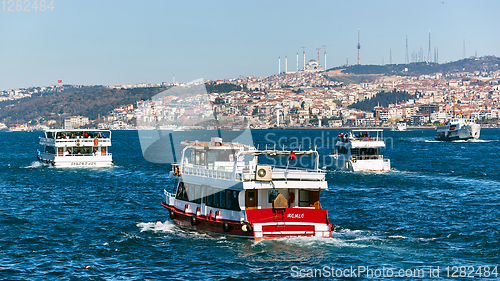 Image of Istanbul, Turkey - 1 April, 2017: Passenger ships crossing Bosporus at spring day