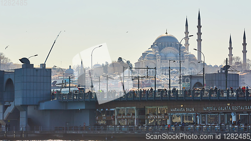 Image of Istanbul, Turkey - April 1, 2017: The Galata bridge with fishermen