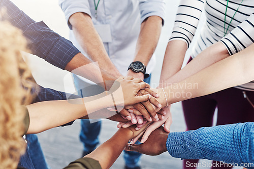 Image of Team, hands together and motivation of staff with collaboration, support and community. Diversity, worker friends and group with achievement, solidarity and agreement hand sign for teamwork success