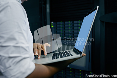 Image of Server room, man or hands of technician with laptop for online cybersecurity glitch or software. IT support, closeup or electrical engineer coding data or fixing network for information technology