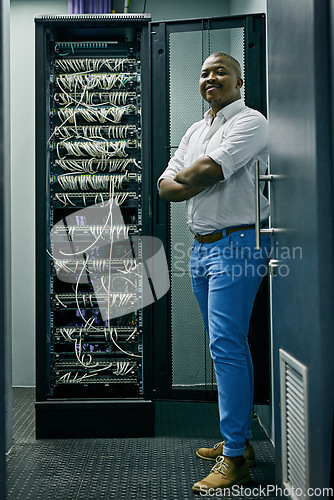 Image of Server room, confident black man or portrait of technician with cables for online cyber security or hardware cords. IT support, happy or proud African engineer fixing wires for information technology