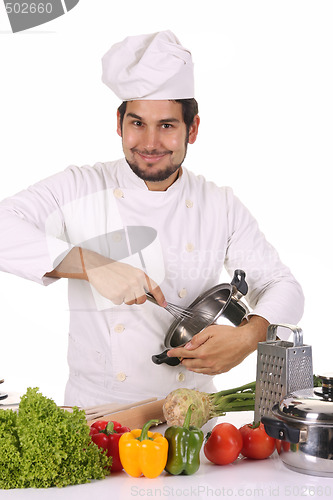 Image of young chef preparing lunch 