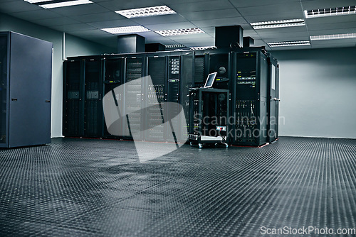 Image of Server room, empty or hardware for internet networking connection, servers or cyber security system. IT support background, information technology electronics or machine equipment in data center