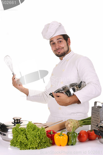 Image of young chef preparing lunch 