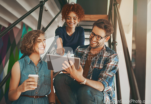 Image of Teamwork, designers talking or happy people with tablet or online report in meeting for data analysis on steps. Research, digital project or creative employees in group discussion in modern office