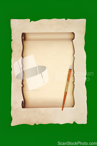 Image of Old Fashioned Writing Equipment with Ink Pen and Parchment Paper
