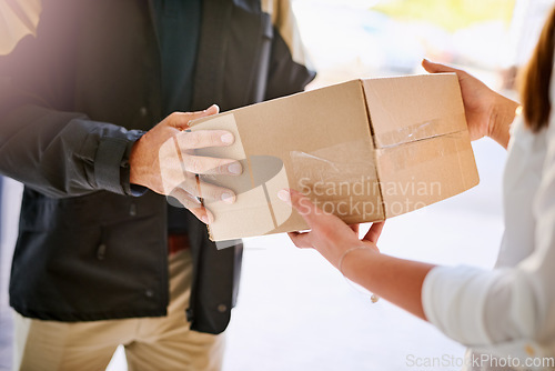 Image of Customer, box and hands of delivery man giving courier company package at home. Logistics worker at front door of woman or client with a cardboard parcel for e commerce shipping or mail distribution