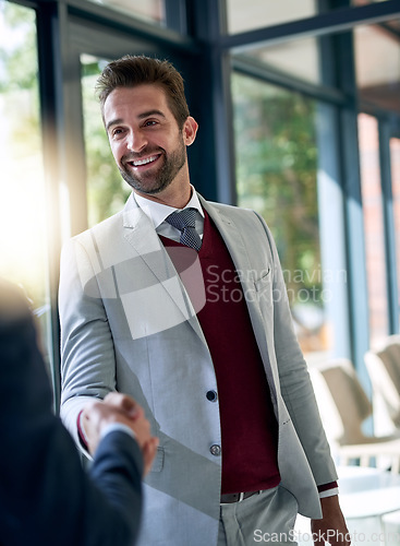 Image of Businessman, handshake and partnership for deal, b2b agreement or hiring in meeting at the office. Happy business people shaking hands in recruiting, teamwork or welcome introduction at the workplace