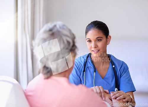 Image of Comfort, healthcare and caregiver with senior patient explaining diagnosis after consultation. Medical, support and female nurse volunteer giving advice to elderly lady in retirement at nursing home.