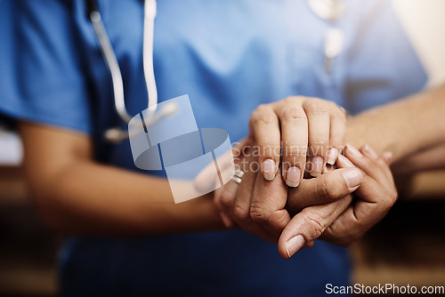 Image of Closeup, doctor holding hands with senior woman and cancer care or support. Healthcare or trust, empathy or compassion and female caregiver or nurse holding elderly person hand for hope and kindness