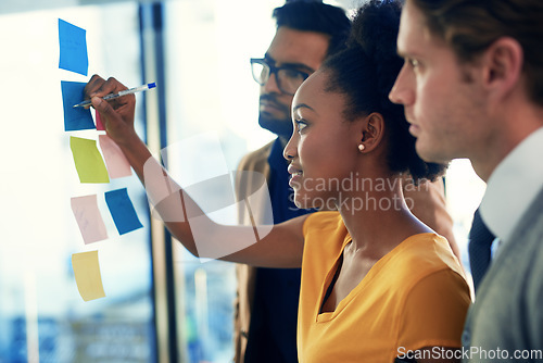 Image of African woman, sticky notes writing and team business meeting with moodboard and planning with collaboration. Company, teamwork and diversity with startup working and strategy with notes and schedule