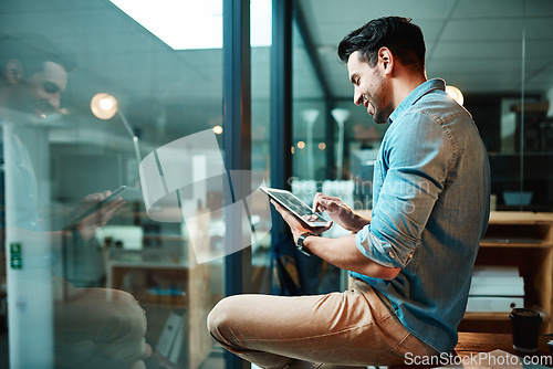 Image of Business man, tablet and smile in office for planning, data update and internet research at window. Happy male employee, digital technology and online information for startup, insight and iot app