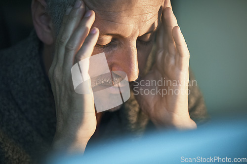 Image of Headache, stress and mature man with depression, pain anxiety due to burnout in the dark feeling sad. Night, mistake or fail by depressed or frustrated person working overtime in an office