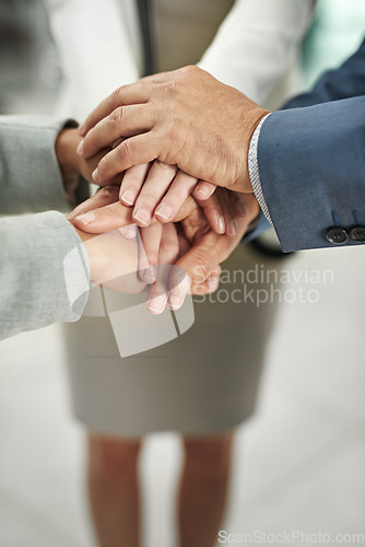 Image of Business people, meeting or hands together in teamwork, collaboration or trust at office. Hand of group stack for team motivation, agreement or support in solidarity for company closeup at workplace