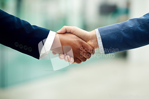 Image of Closeup, corporate and business people shaking hands in office for partnership, introduction and hiring negotiation. Employees, handshake and support of success, networking and promotion opportunity