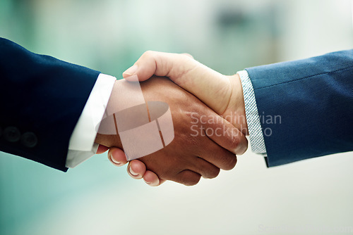 Image of Business people, closeup and handshake for corporate deal, partnership and team meeting for sales negotiation. Employees shaking hands in support, success and b2b networking for promotion opportunity