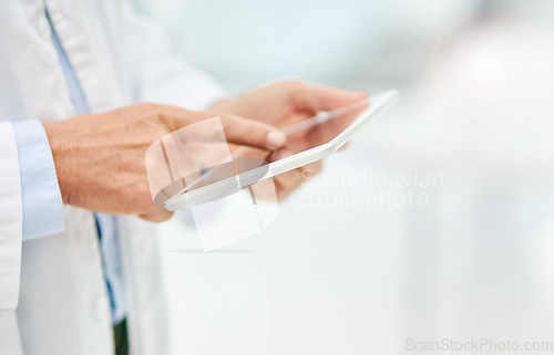 Image of Man, doctor and hands on tablet for research, medical history or digital prescription at hospital. Hand of person or healthcare professional working on technology for telehealth data on mockup space