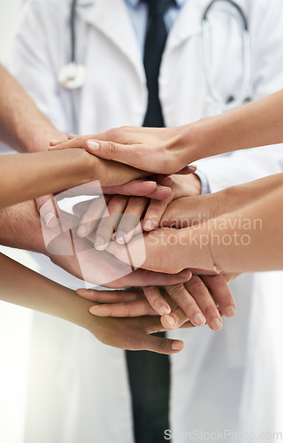 Image of Teamwork, motivation and support with hands of doctors for medical, collaboration and solidarity. Medicine, healthcare and expert with closeup of people in meeting for target, goals and mindset