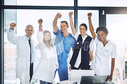 Image of Doctor, team and celebration in healthcare for winning, success or achievement together at the hospital. Group portrait of happy doctors in joy for medical win, victory or teamwork at the clinic