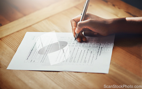 Image of Hand, survey and pen writing on checklist for legal contract, loan application data or insurance agreement. Person, document and information for documentation, policy compliance or paperwork report