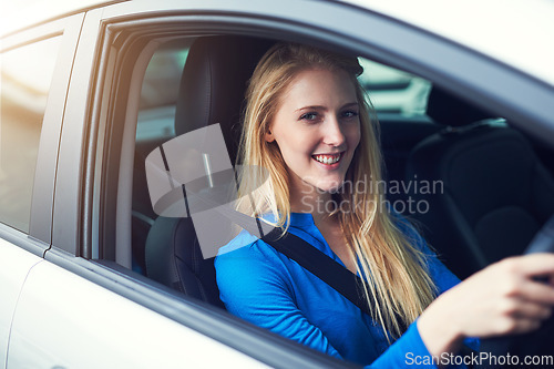 Image of Portrait, smile and woman driving car for travel, journey and transportation. Face, happy and female person in vehicle, automobile and motor transport driver for traveling, road trip drive and moving