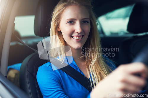 Image of Happy, portrait and woman driving car for travel, journey and transportation. Face, smile and female person in vehicle, automobile and motor transport driver for traveling, road trip drive and moving