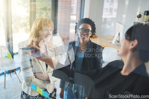 Image of Happy women, teamwork and brainstorming notes on window for schedule, mindmap and planning goals, agenda or solution. Diversity, collaboration and ideas on glass of innovation, objectives and mission