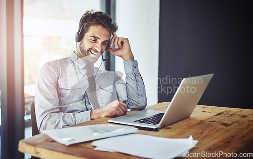 Image of Happy businessman, laptop and call center in customer support or financial advice at the office. Friendly man person, consultant or agent talking on headset for online consulting service at workplace