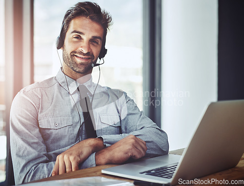 Image of Businessman, laptop and portrait smile in call center, customer support or financial advice at office. Friendly man person or consultant agent with headphones for online consulting help at workplace