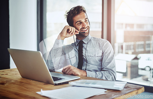 Image of Happy businessman, laptop and call center headphones for customer service or financial advice at office. Friendly man person or consultant agent talking on headset in online consulting at workplace