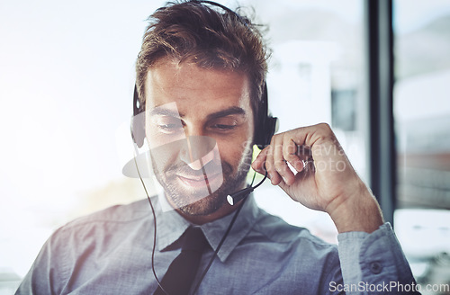 Image of Man, call center and microphone to listen in office, help desk or talking for telemarketing job. Consultant, agent and crm with customer service, tech support or telecom with headphones, mic and job