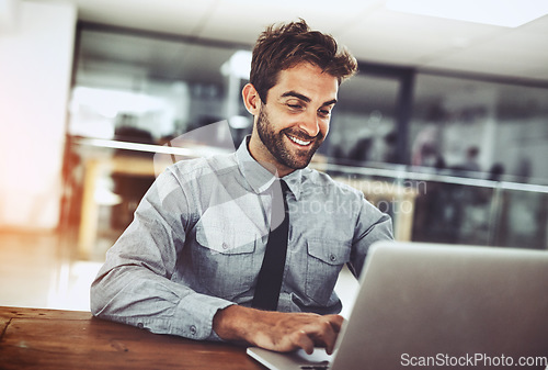 Image of Happy businessman, laptop and typing email for communication, schedule or networking at office. Male person or employee working with smile on computer in project or social media browsing at workplace