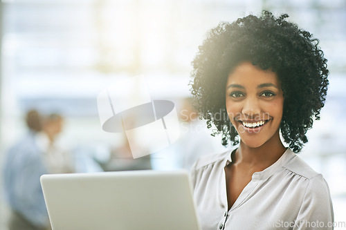 Image of Black woman in business, laptop and happy in portrait, technology with connectivity and success in workplace. Professional female person holding pc, pride and email communication on office internet