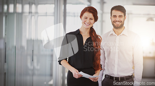 Image of Business people, portrait smile and paperwork for meeting, planning or corporate finance at the office. Happy businessman and woman smiling with documents for team leadership or financial management