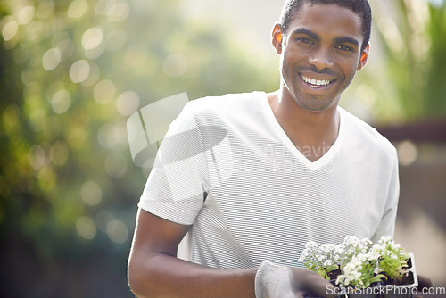 Image of Black man, sustainability and flower growth in nature for space, environment development and smile. Plant, growing and sustainable eco friendly of a person with mockup, community for climate change